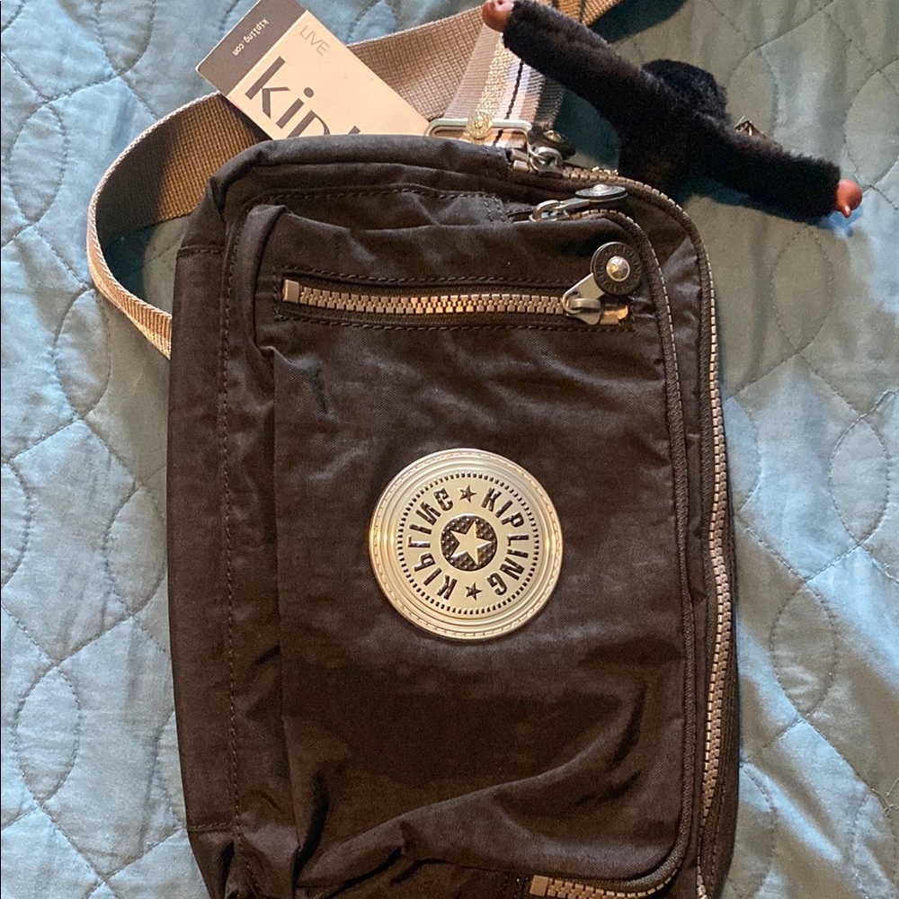 Kipling Black Messenger Bag with Adjustable Strap and Durable Nylon